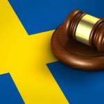 weden-law-legal-system-and-justice-concept-with-a-3d-rendering-of-a-gavel-on-swedish-flag